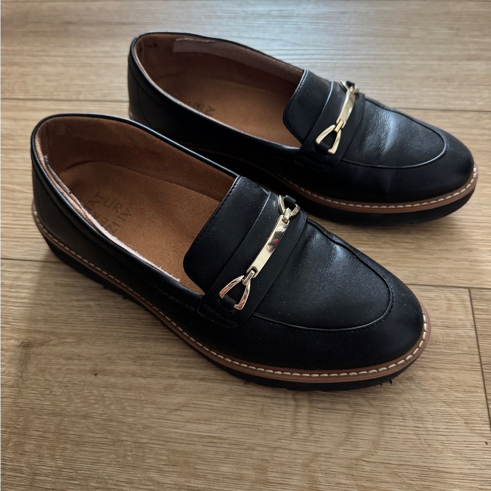 Naturalized Black Loafers with Gold Buckle Accent